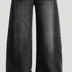 Black wide-leg jeans on a light gray background