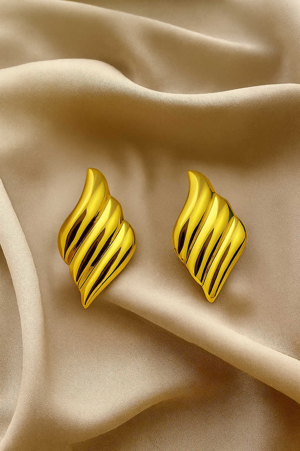 Golden Wave Leaf Earrings – Stainless Steel Statement Design