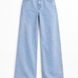 Broad green striped shirt  with Light Blue baggy jeans