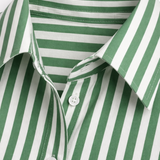 Broad green striped shirt  with Light Blue baggy jeans